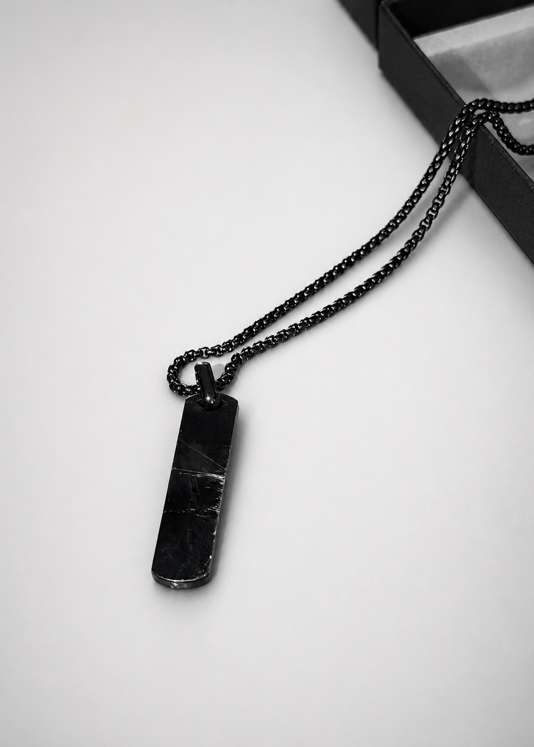 Scratched Black Building Block pendant with character