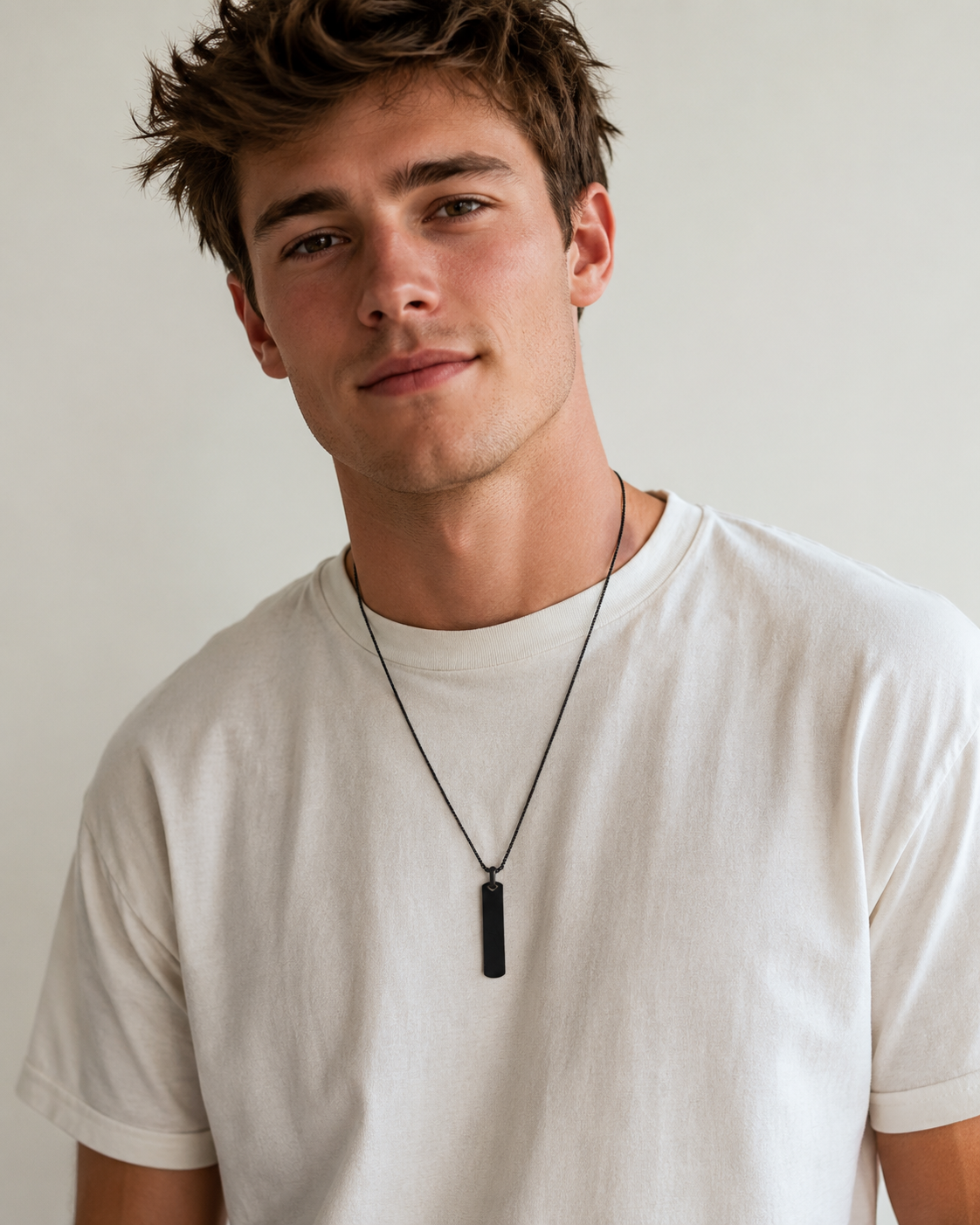 Young man with the Black Building Block pendant